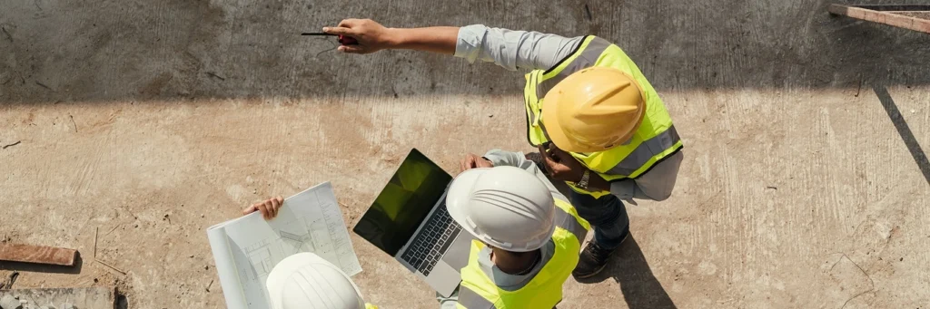 construction employees working onsite - time tracking to be entered into construction payroll solution system